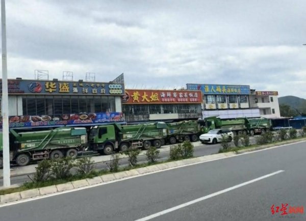 天天盈 珠海一老板租十几辆大卡车把店团团围住，当地店家：每年刮台风都租，每台约400元
